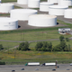 Traffic on I-95 passes oil storage tanks owned by the Colonial Pipeline Company in Linden, New Jersey.